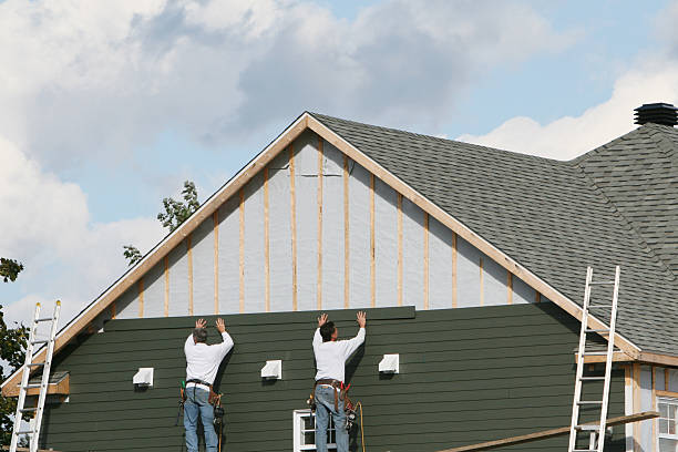 Professional Storm Damage Siding Repair technician working in Franklin, IN